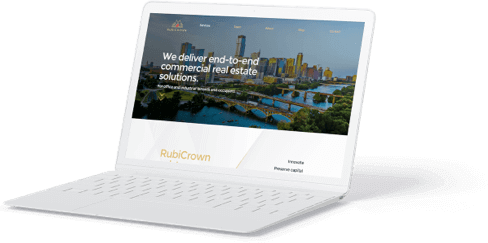 Laptop displaying the homepage of the company Rubicrown